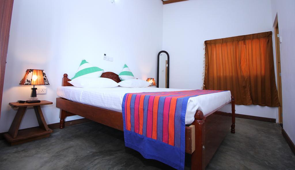 Ocean Breeze Villa Boossa Номер фото